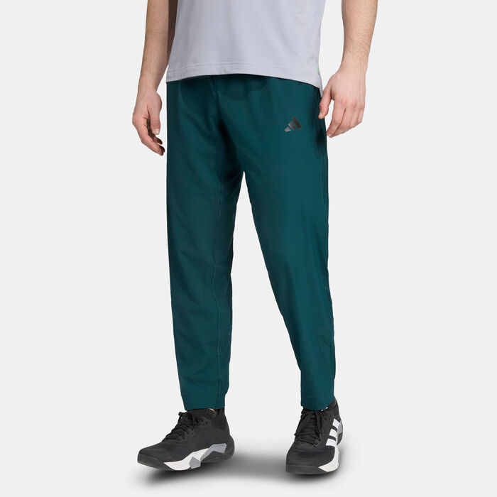اديداس بنطال التمرين ترين ايسنشالز للرجال أخضر image number 0
