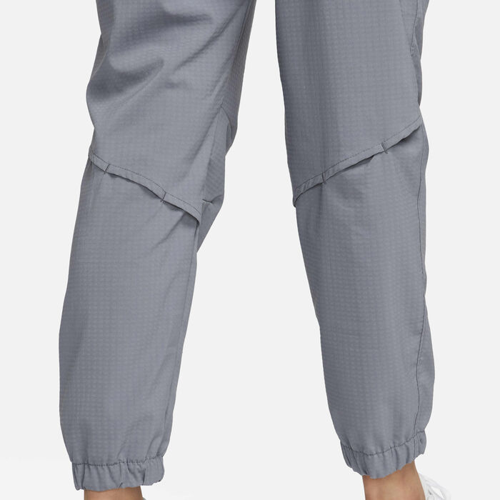 نايكي دراي-فت فاست بنطال الجري ميد-رايز 7/8 وورم-اب للنساء رمادي image number 4