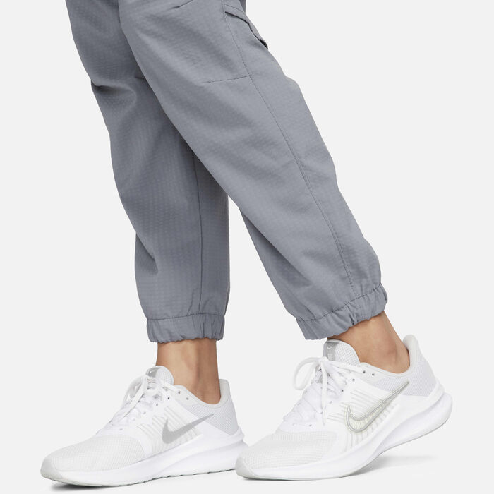 نايكي دراي-فت فاست بنطال الجري ميد-رايز 7/8 وورم-اب للنساء رمادي image number 5