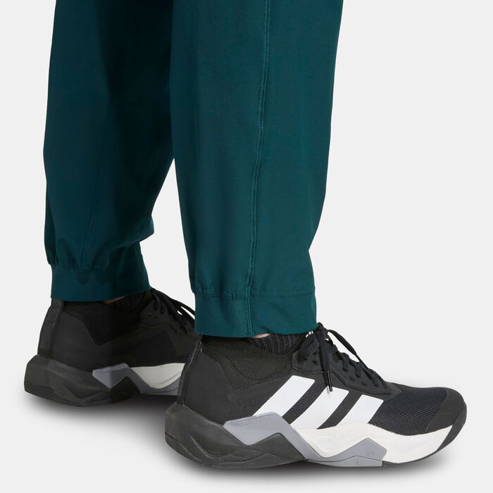 اديداس بنطال التمرين ترين ايسنشالز للرجال أخضر image number 3